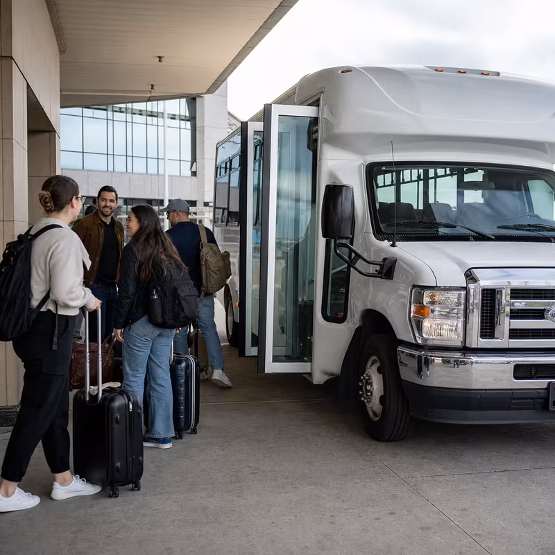 Black Mercedes Sprinter van staged for an Omaha Airport Transportation group