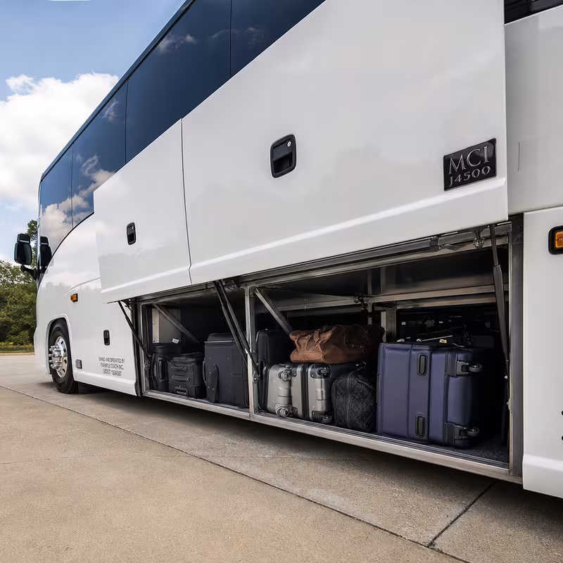 Party bus interior with wraparound leather seating and LED lighting in Omaha